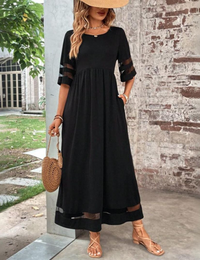 Langes Kleid mit Tüllärmeln für einen femininen Stil