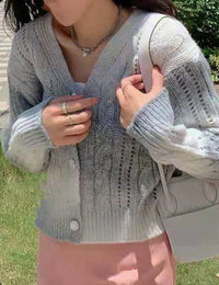 Damenweste aus Zopfmusterstrick mit Knöpfen Damenpullover