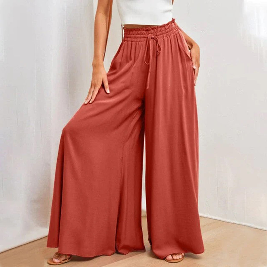 skirts : Jade – Pantalon palazzo ample à jambes larges et taille haute in Rouge van Seroa