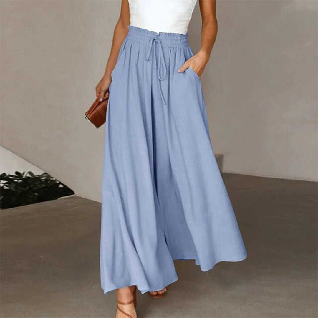 skirts : Jade – Pantalon palazzo ample à jambes larges et taille haute in Bleu van Seroa