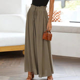 skirts : Jade – Pantalon palazzo ample à jambes larges et taille haute in Vert van Seroa