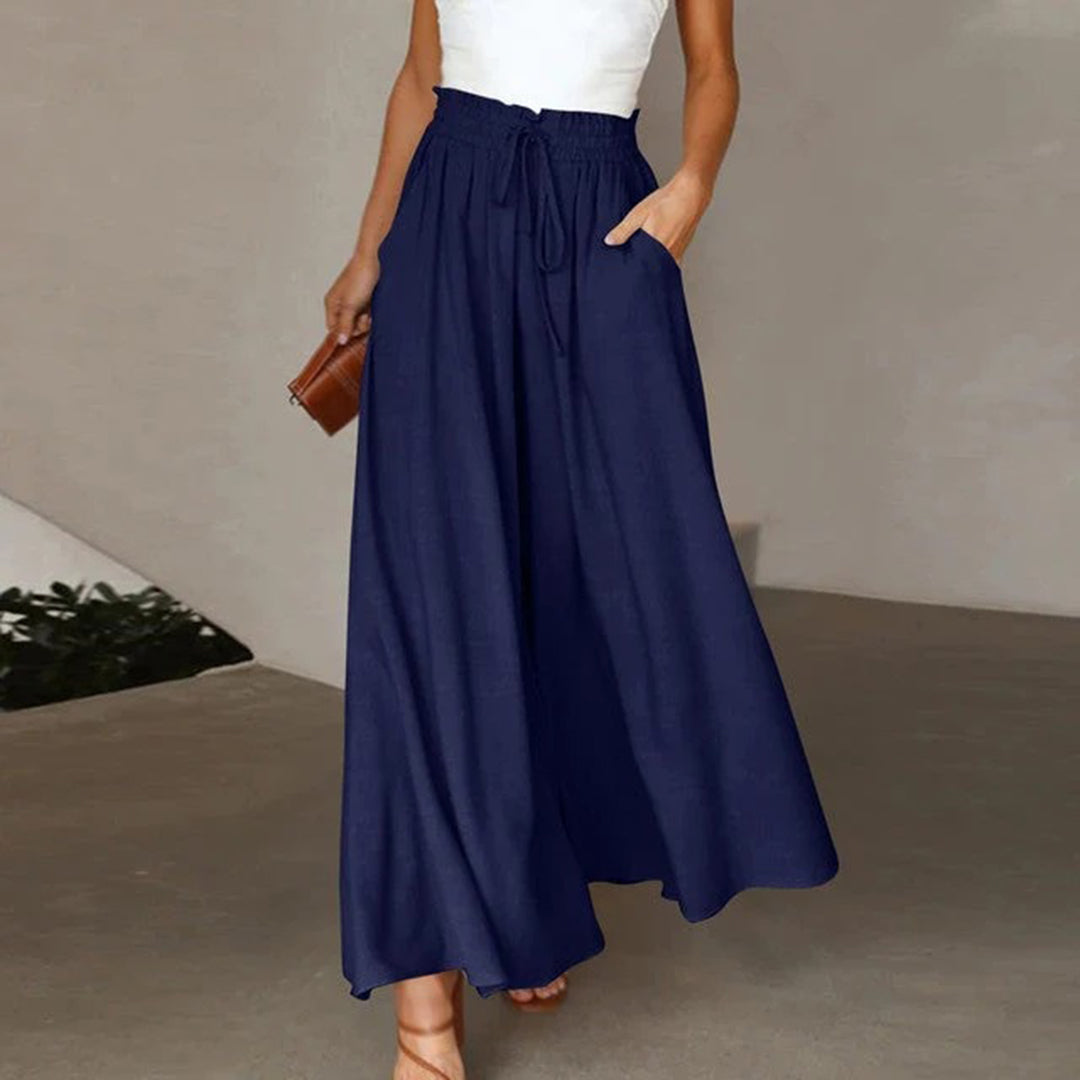 skirts : Jade – Pantalon palazzo ample à jambes larges et taille haute in Bleu marine van Seroa