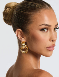 Boucles d'oreilles pendantes Femme or en acier titan