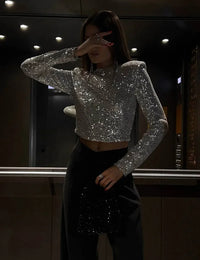 Elegantes kurzes Top mit langen Ärmeln und Pailletten Damen