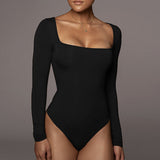 top blouses : Maya – Body élégant sans coutures à manches longues et encolure carrée in Noir van Seroa