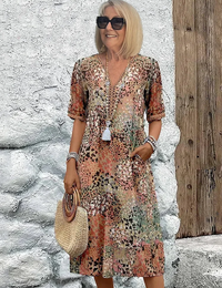 Leichtes Midikleid mit Blumenmuster, V-Ausschnitt und Taschen für Damen