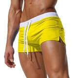swimwear : Joseph – Short de bain ultra-ajusté, taille basse, à séchage rapide in Jaune van Seroa