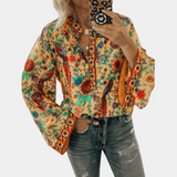 top blouses : Sofia - Blouse Bohème à Manches Évasées et Motif Fleuri in Orange van Seroa