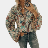 top blouses : Sofia - Blouse Bohème à Manches Évasées et Motif Fleuri in Abricot clair van Seroa