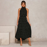 dresses : Maria – Élégante robe midi à pois avec volants in Noir van Seroa
