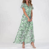 dresses : Charlie – Élégante robe longue en mousseline à motif floral in Vert van Seroa