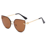 other : Dorothea | Lunettes de Soleil Femme Cat Eye Métal in Tissu libre Or Thé van Seroa