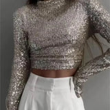 top blouses : Sia – Top Court Élégant à Manches Longues et Sequins in Argent van Seroa