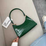 Sacs à main : Slyvia | Sac à main femme en cuir PU élégant et pratique in Vert van Seroa