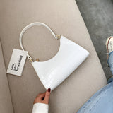 Sacs à main : Slyvia | Sac à main femme en cuir PU élégant et pratique in Blanc van Seroa