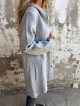 Veste Femme Élégante à Capuche 1