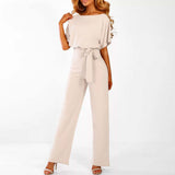 dresses : Lyla – Élégante Combinaison ceinturée à Jambes Larges in Beige van Seroa