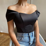 top blouses : Elena – Top Corset Structuré Élégant à Épaules Dénudées in Noir van Seroa