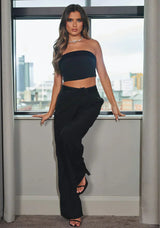 dresses : Isla - Ensemble Élégant Deux Pièces Pantalon Ample et Haut Bandeau in Noir van Seroa