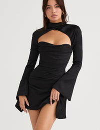 Elegantes Damenkleid mit detaillierten Ärmeln und Ausschnitten, ideal für Abend oder Cocktail